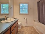 Primary Bathroom with Tub/Shower Combo and Dual Sinks